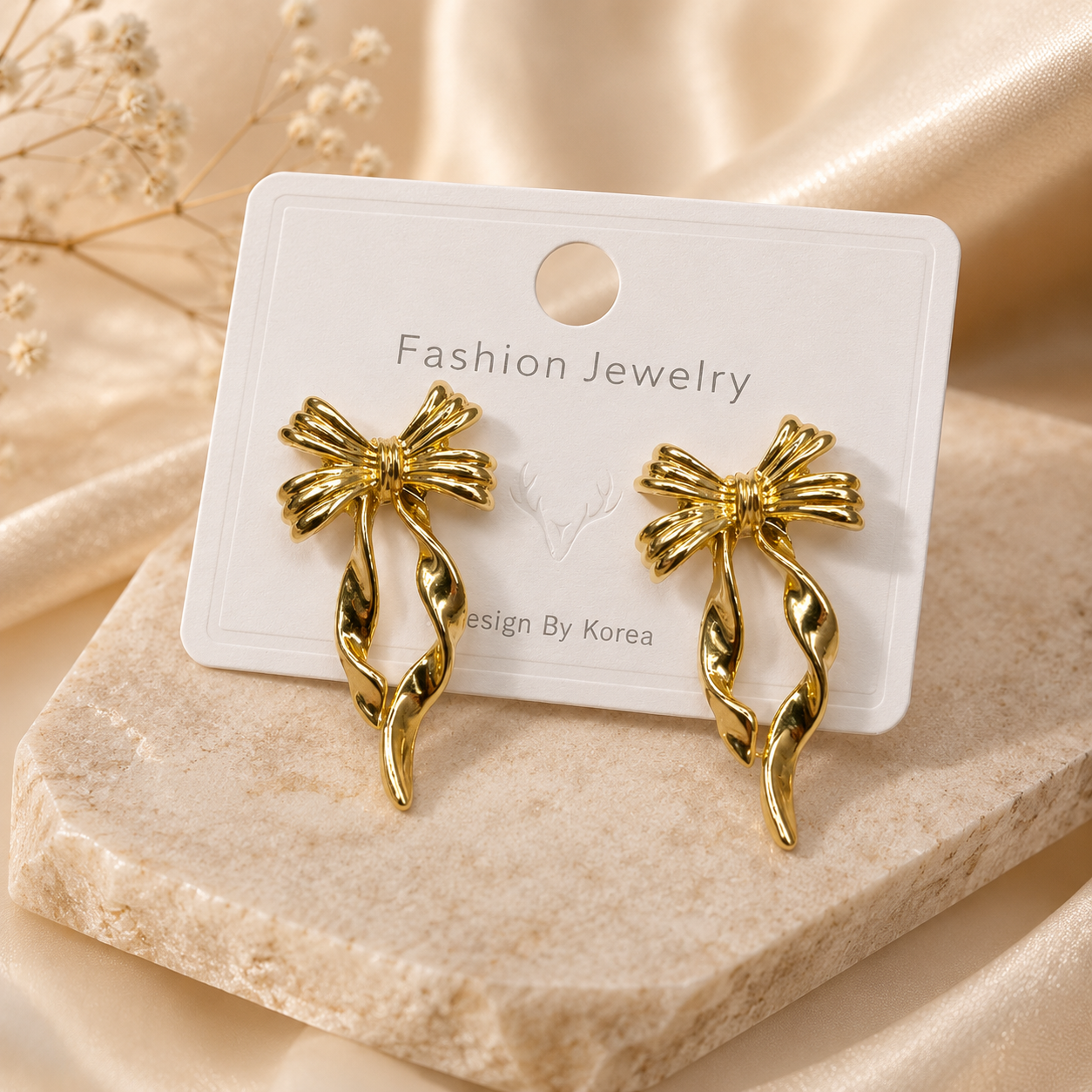 The Korean Sculpted Gold Ribbon Drops