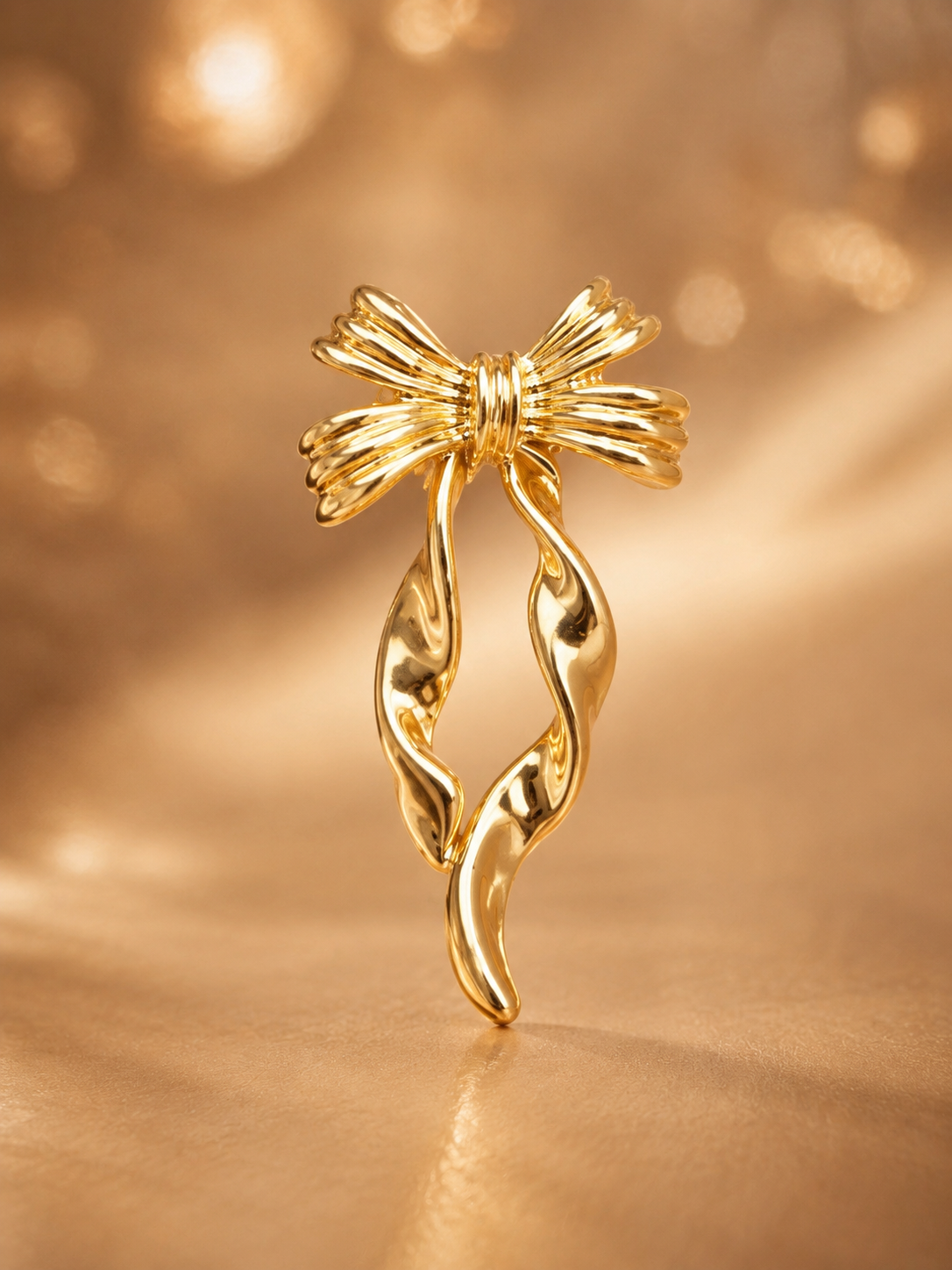 The Korean Sculpted Gold Ribbon Drops